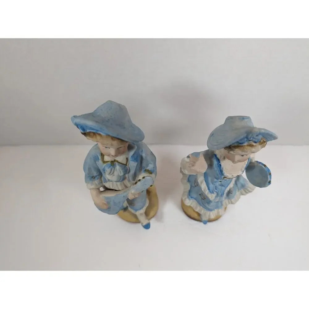 Vintage L & M INC. 8 1/2 '' TALL SET OF TWO BISQUE FIGURINES BOY & GIRL IN BLUE